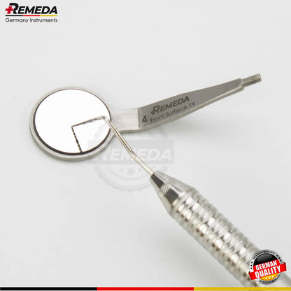 Close-up of a double sided front surface mouth mirror used in clinical dentistry to eliminate ghost images